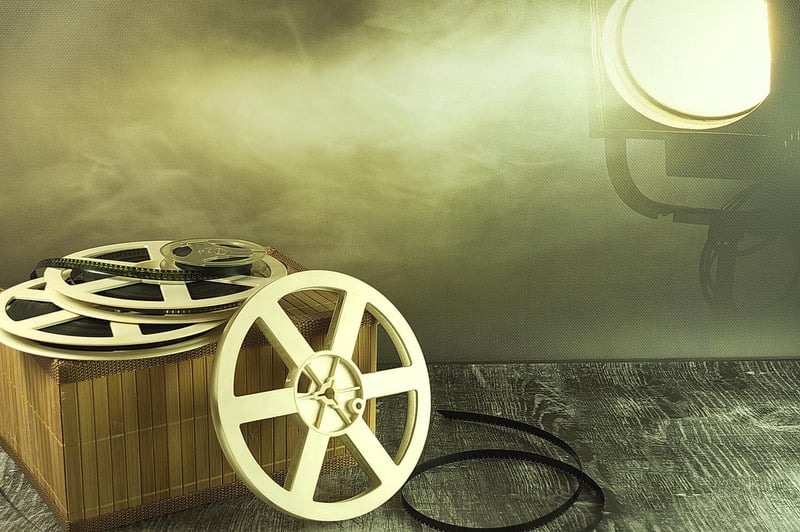 Movie reel projector in a cinema