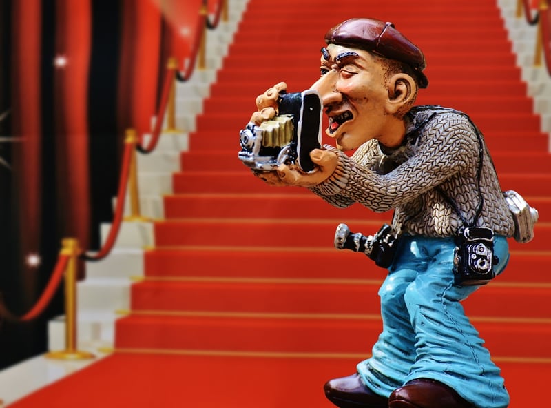 Paparazzi photographing a celebrity